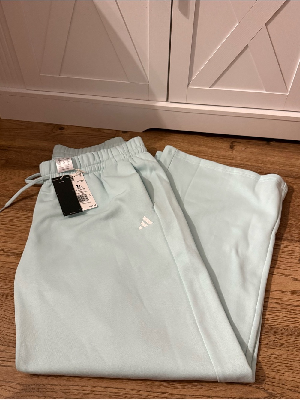 Adidas Women’s Pale Blue sweatpants with White Logo